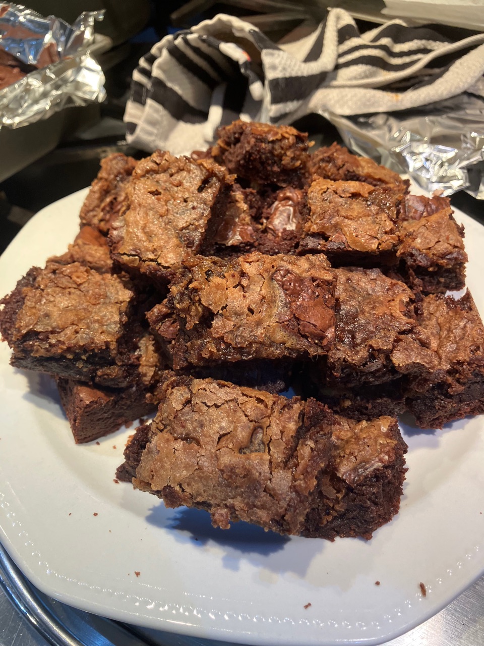 A plate piled with homemade brownies