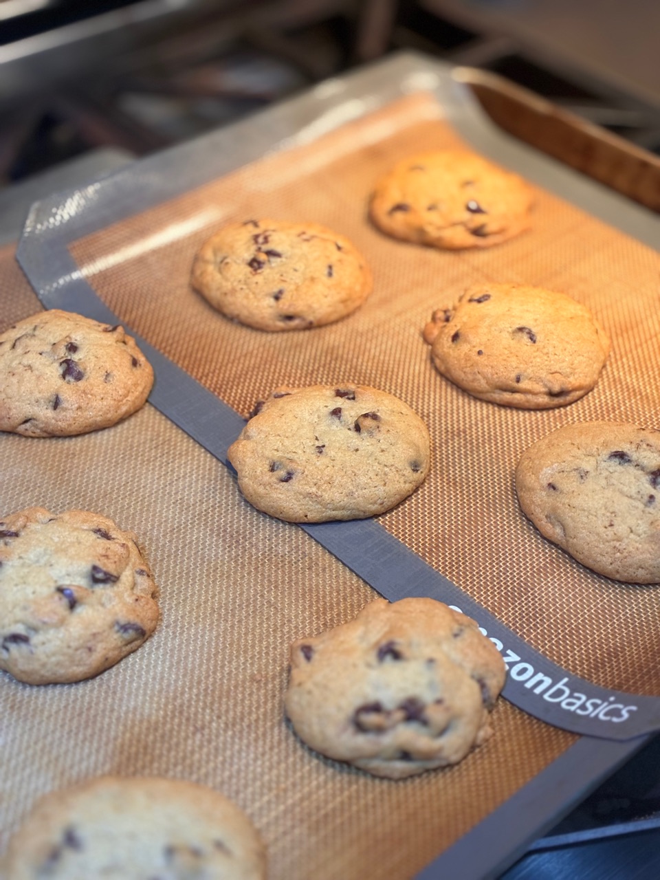 Golden chocolate chip cookies fresh from the oven
